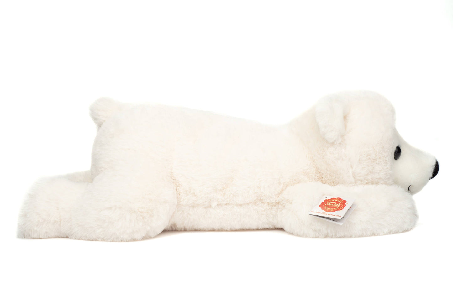 Peluche ours polaire allongé