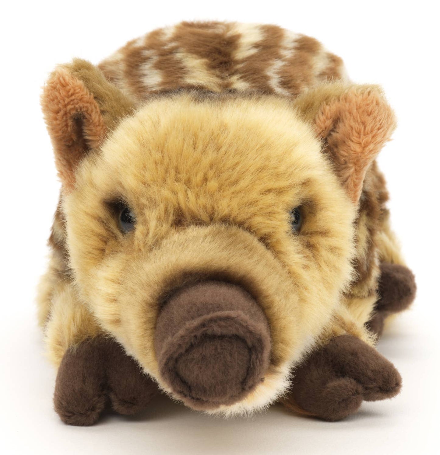 Plush toy of a sleeping wild boar