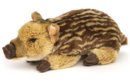 Plush toy of a sleeping wild boar